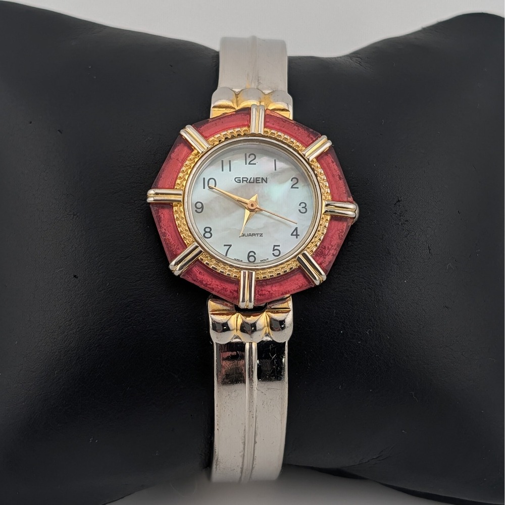 Gruen CR7183 Mother of Pearl Dial Red lucite Bezel Two Tone Bangle Watch